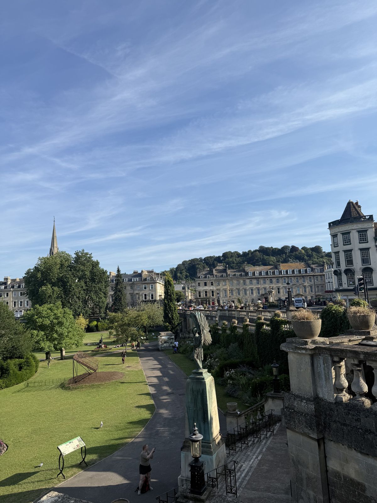 A view across Parade Gardens toward the honey-stone rooftops of central Bath