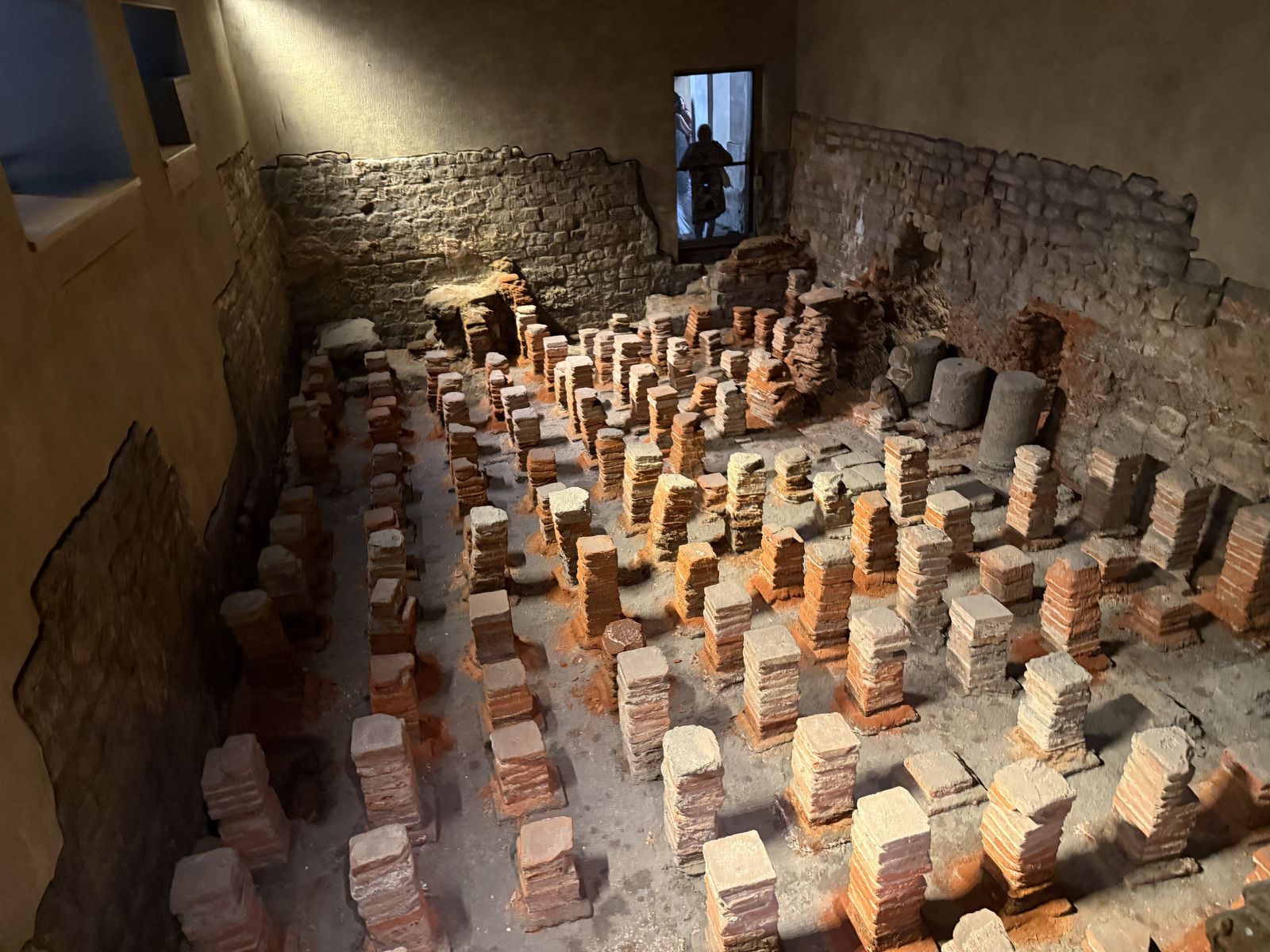 Roman hypocaust under-floor heating pillars at the Roman Baths in Bath